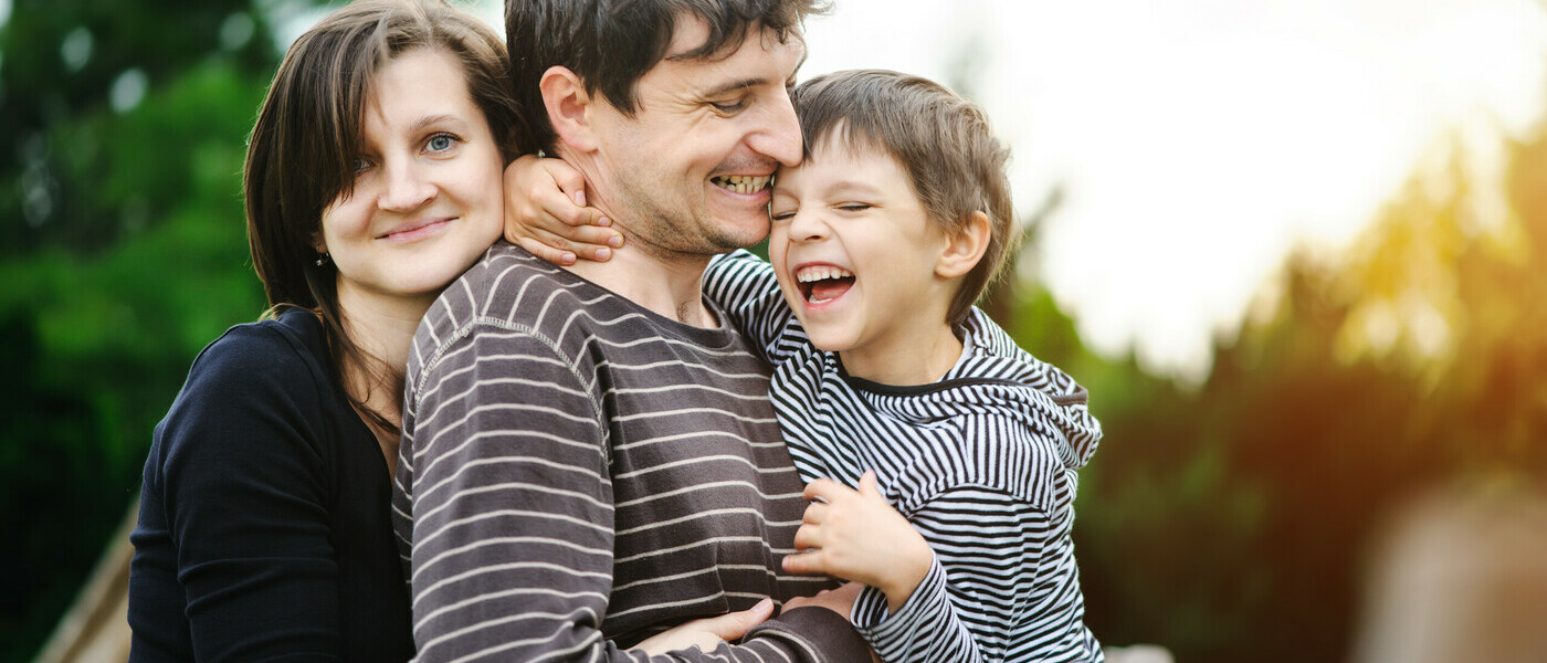 Family love. Smiling and enjoying time outdoor